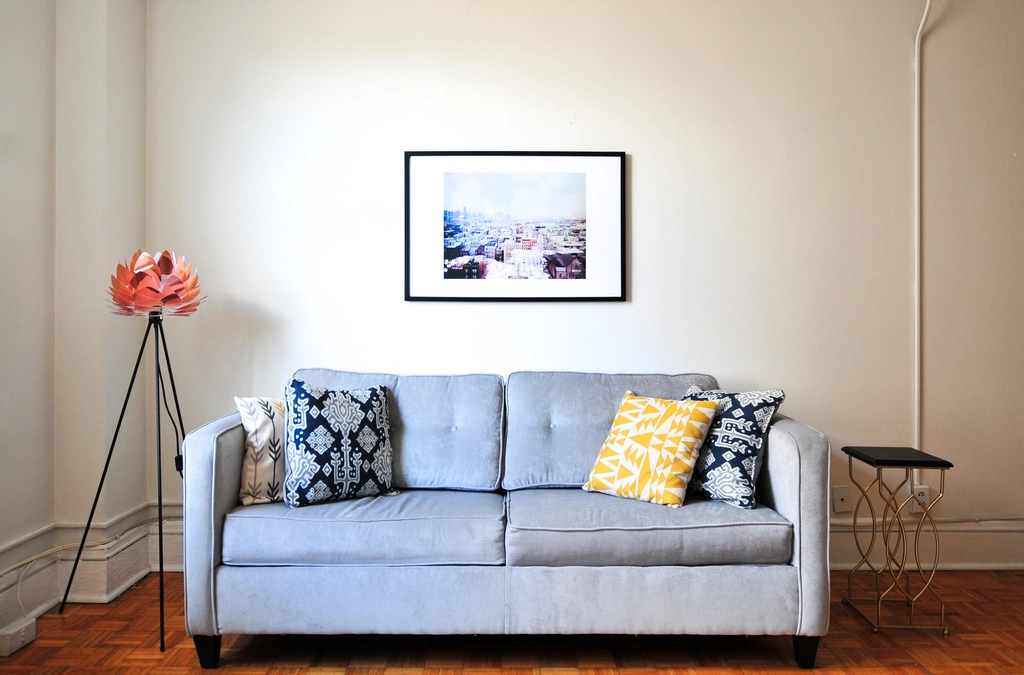 Gray couch with decorative pillows in a living room