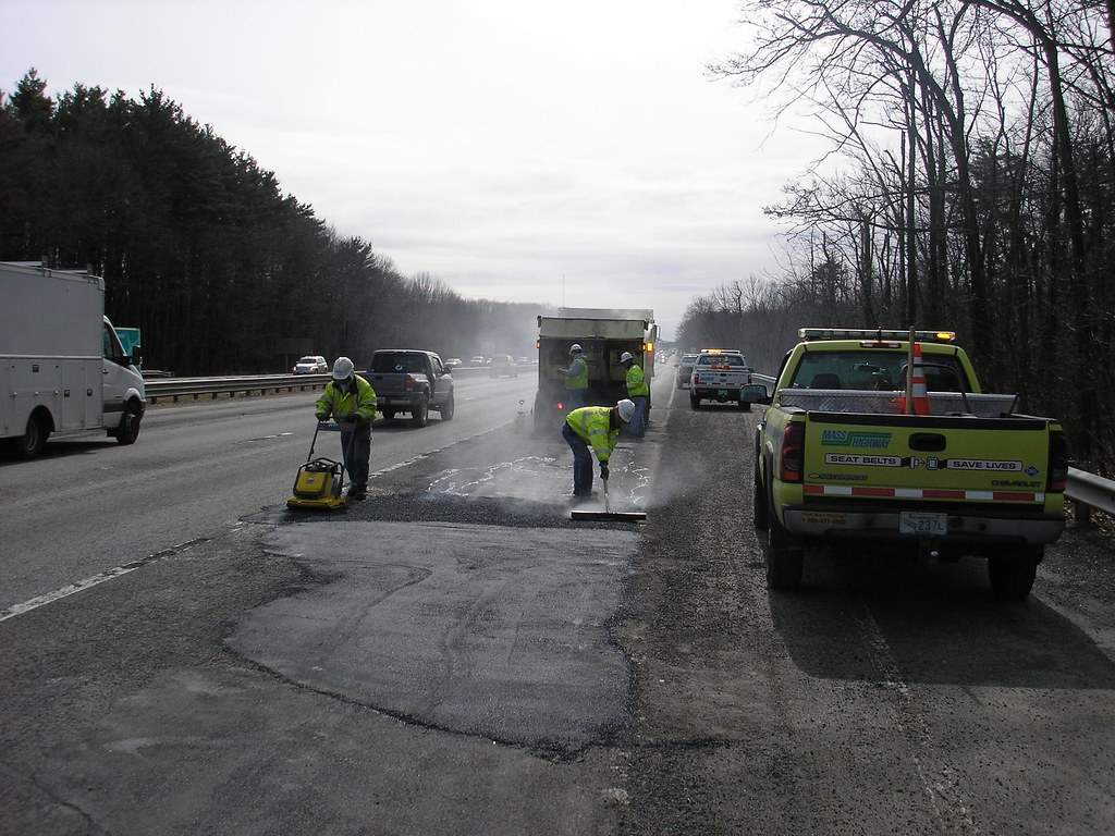 Pothole repair crew on a different road from the Delancey Avenue pothole